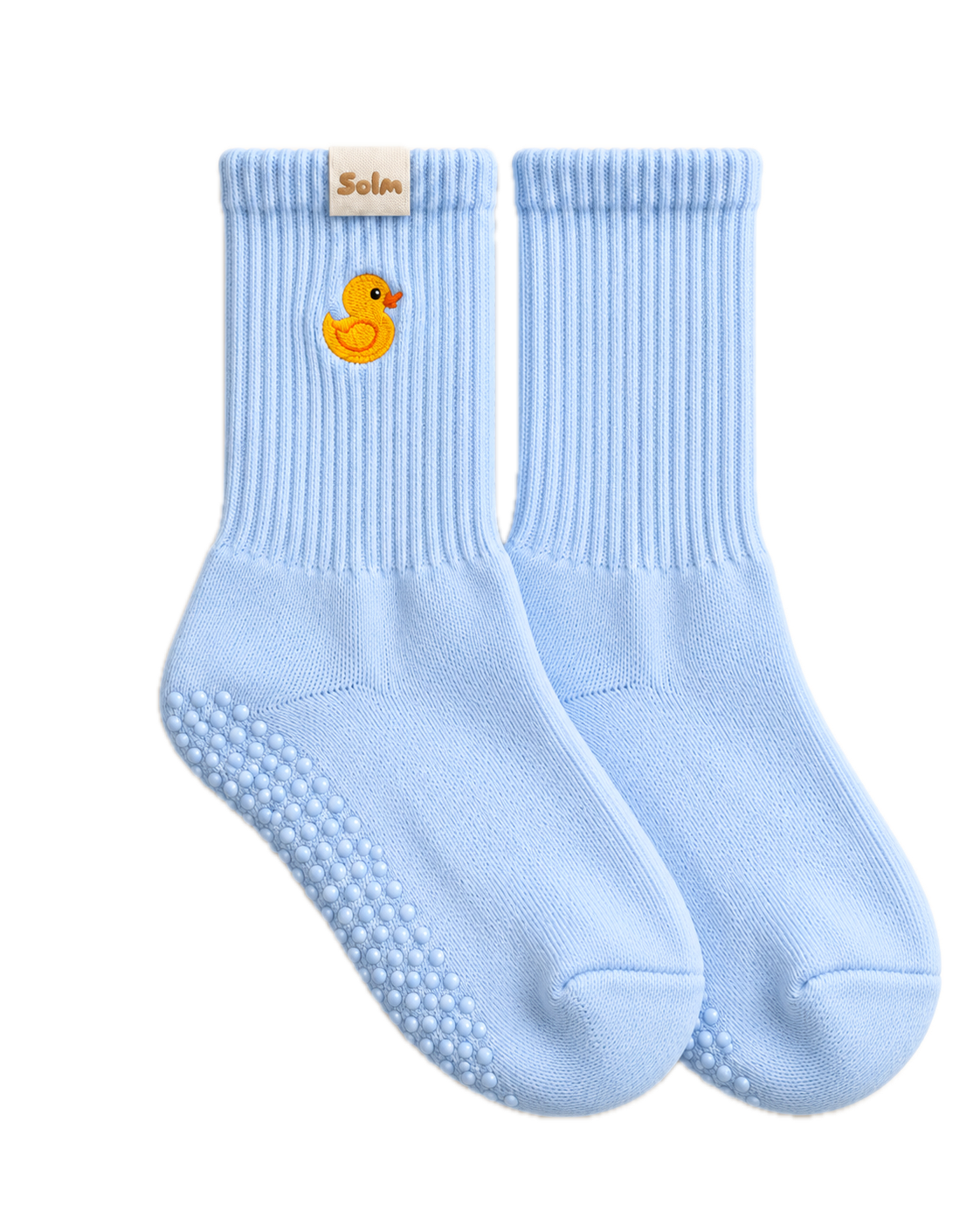 Little Quack grip socks, a pair laid flat